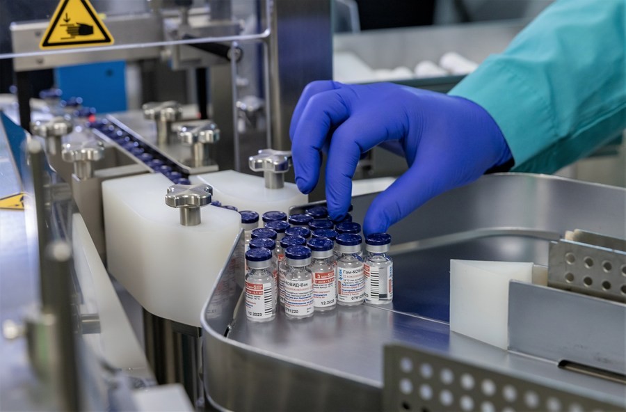 Photo taken on Dec. 22, 2020 shows the production line of the Russian "Sputnik V" vaccine at a pharmaceutical plant in the Karaganda Region of Kazakhstan. (Photo by Kalizhan Ospanov/Xinhua)